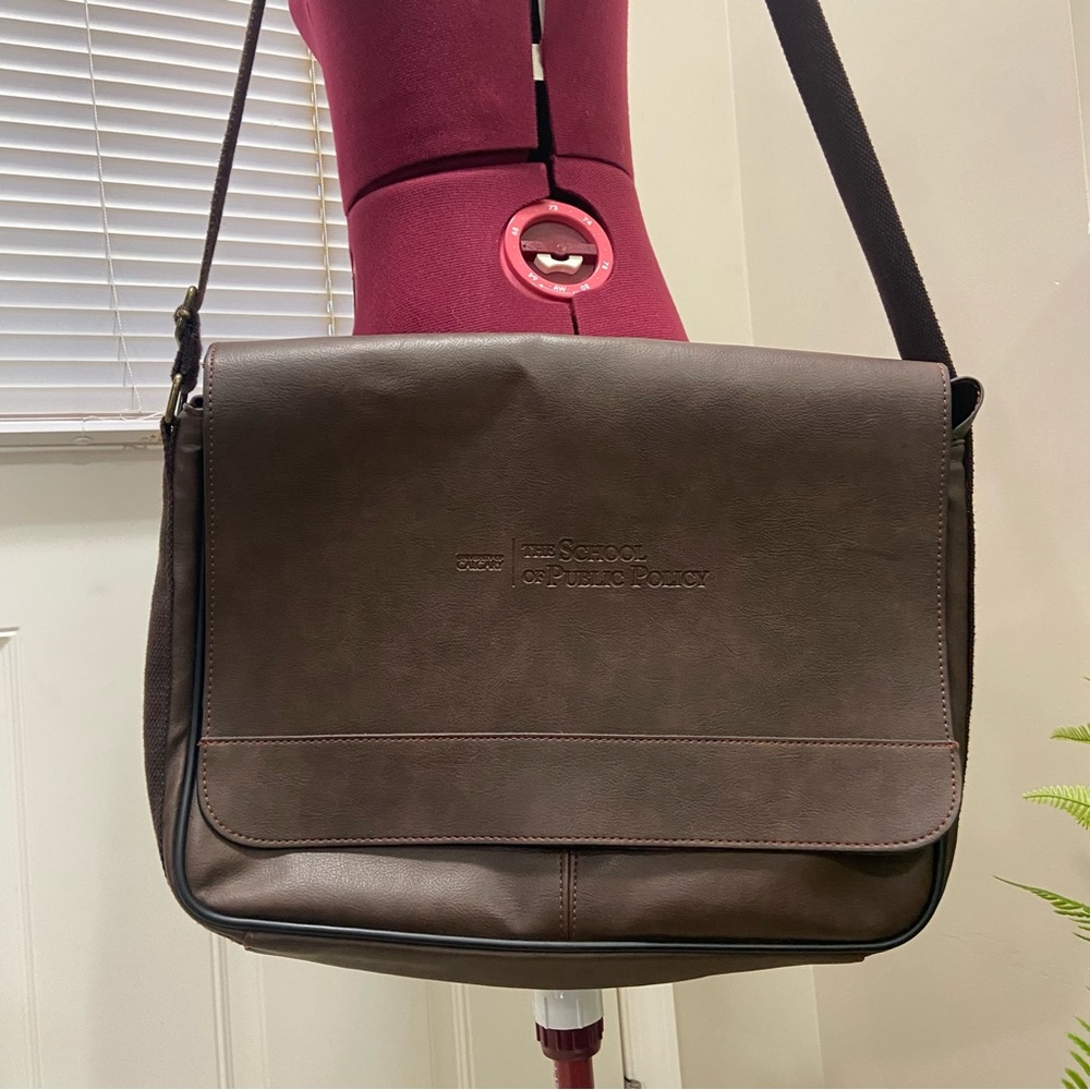 Debco brown leather University of Calgary stamped messenger shoulder bag. Used.